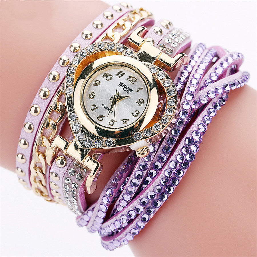 Montre-bracelet pour femme avec cadran rond en diamants Love
