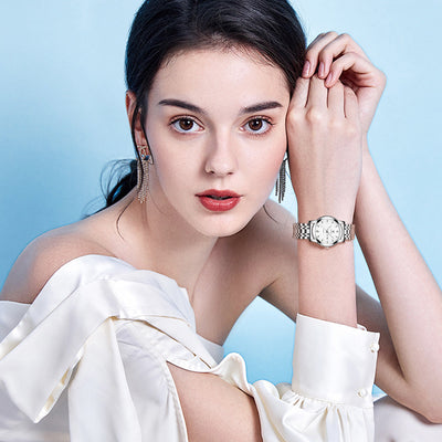 Petite et exquise montre à quartz lumineuse et étanche pour femme