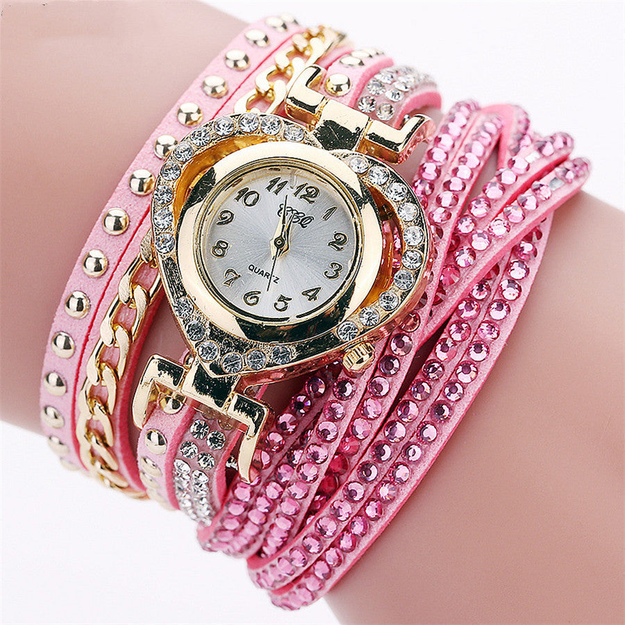Montre-bracelet pour femme avec cadran rond en diamants Love