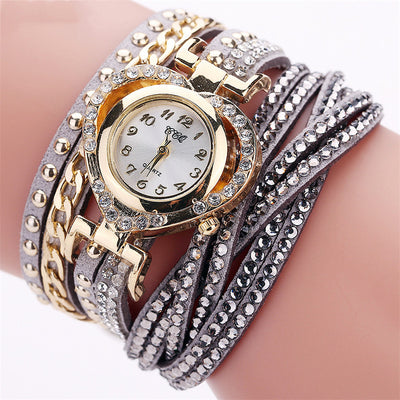 Montre-bracelet pour femme avec cadran rond en diamants Love