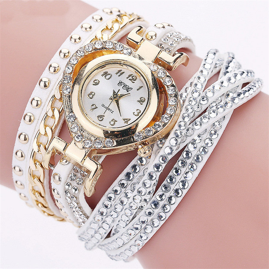 Montre-bracelet pour femme avec cadran rond en diamants Love